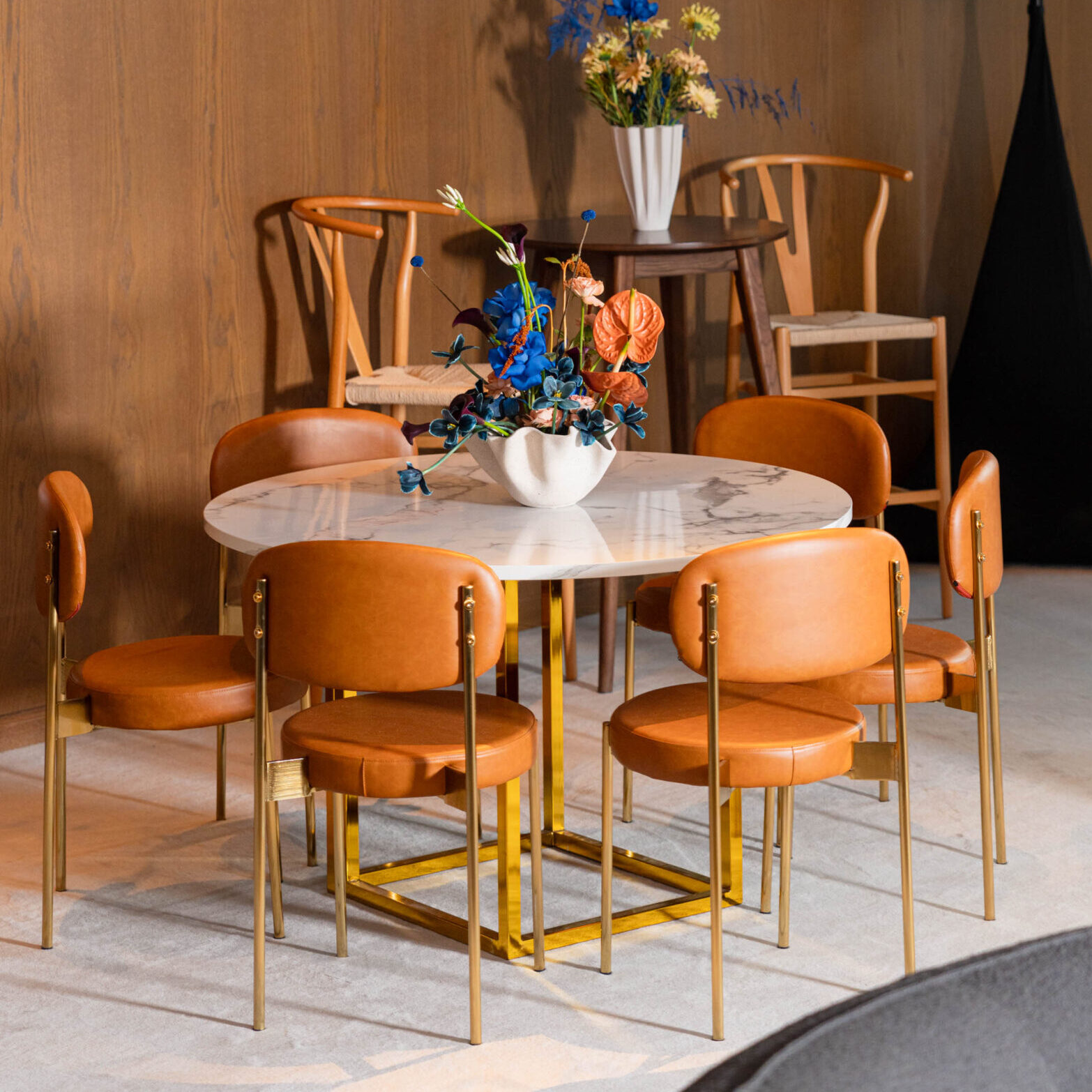 Optical-round-dining-table-1.2M-marblegold-duke-dining-chair-lathergold-scaled-e1750923043413